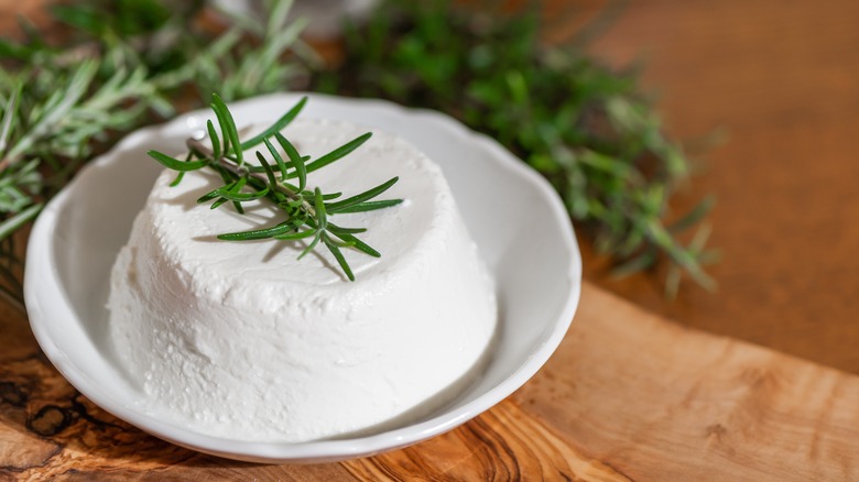 Ricotta with rosemary garnish