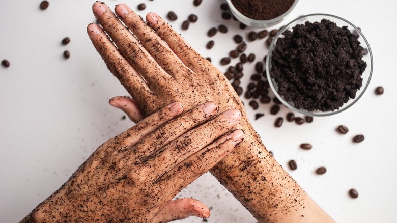 Coffee grounds on hands 