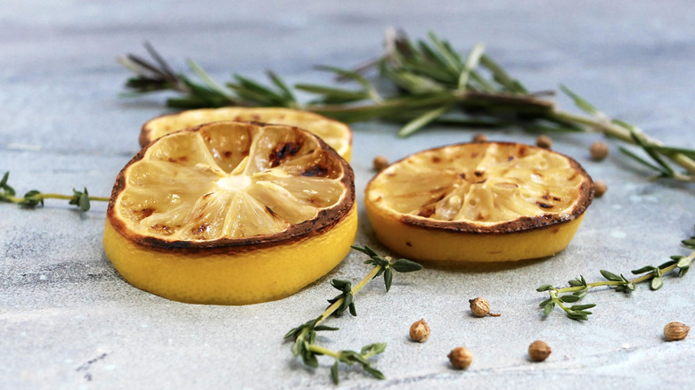 Charred lemons with herbs