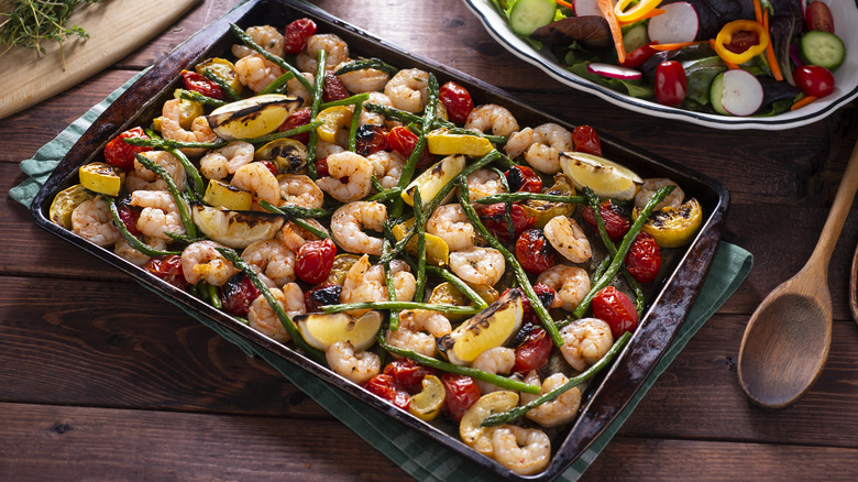 Shrimp and veggies on baking sheet 