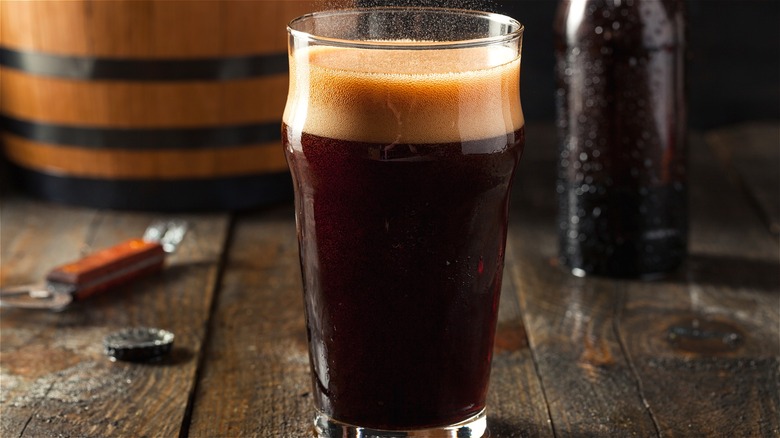 Glass of fizzy root beer 