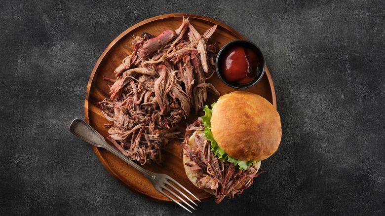 Pulled pork on wooden dish