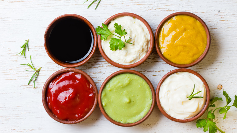 Assortment of sauces in multiple bowls