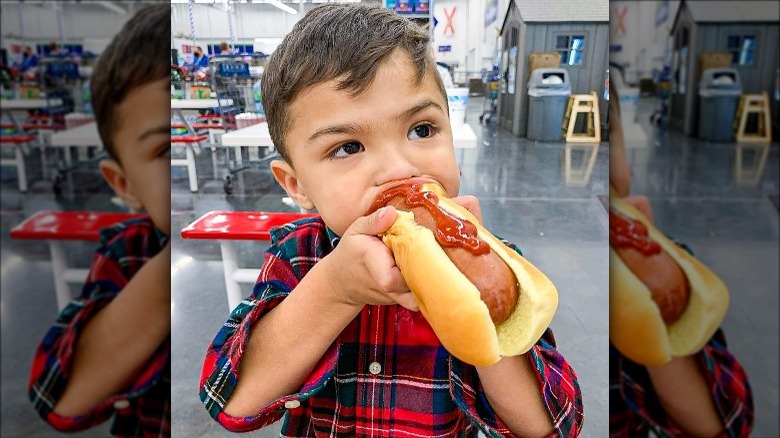 Child eating a hot dog