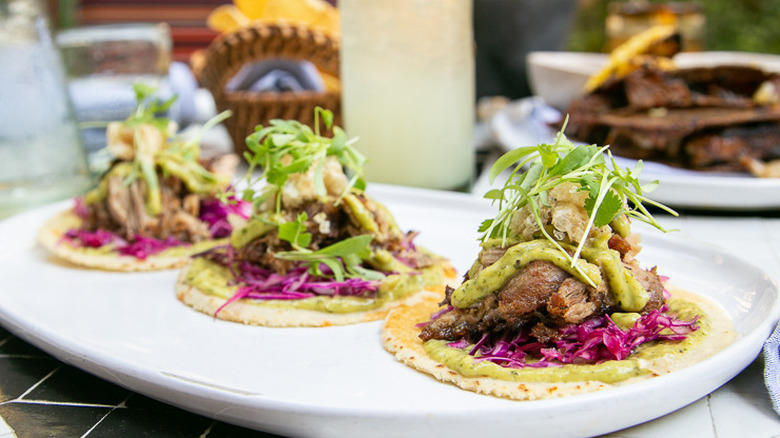 Domingo carnitas tacos on plate