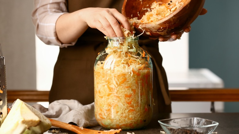 woman making sauerkraut