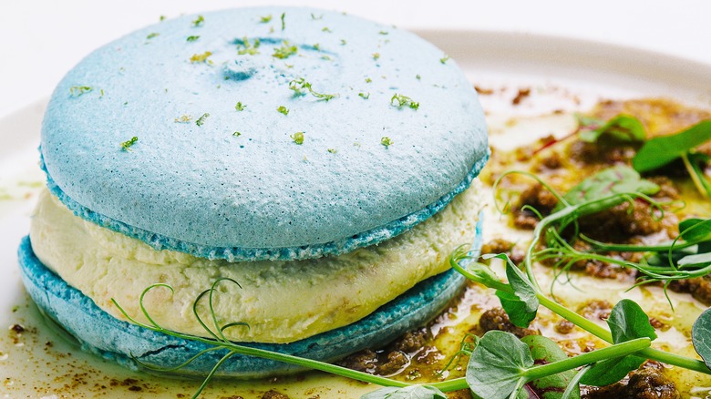 light blue macaron with garnish