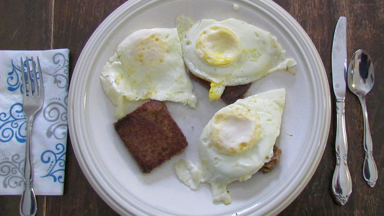 scrapple served at breakfast with fried eggs