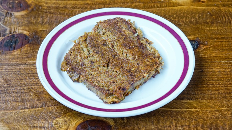Scrapple slices on plate