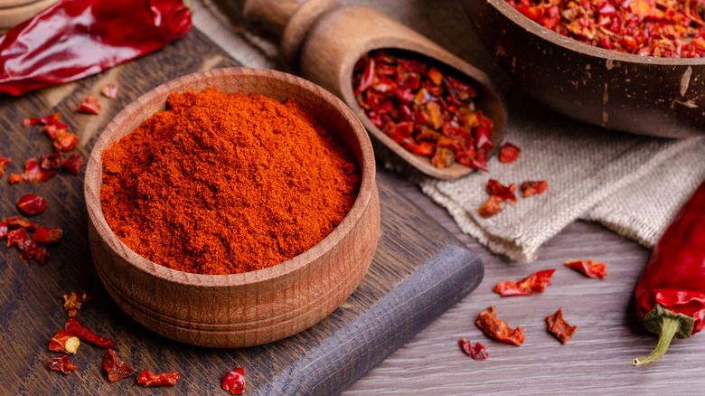 smoked paprika in wooden bowl