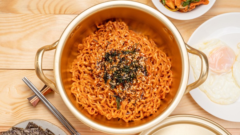 Top-down view of kimchi fry topped with seaweed