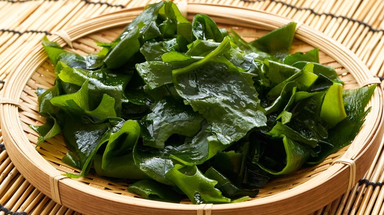 Closeup of seaweed on a wooden plate