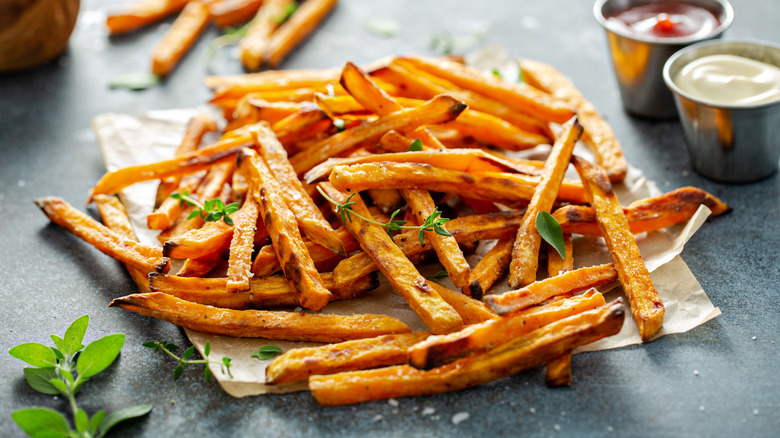 Sweet potato fries with condiments