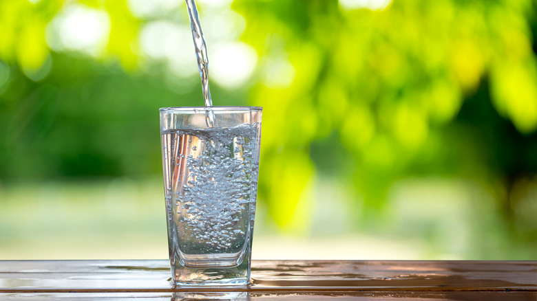 sparkling water poured into glass