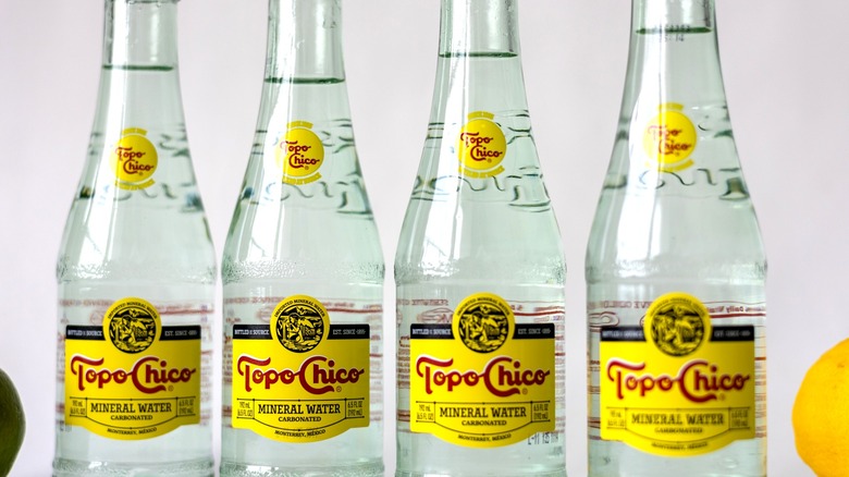 bottles of topo chico water