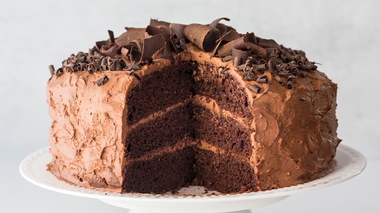 chocolate cake topped with chocolate shavings