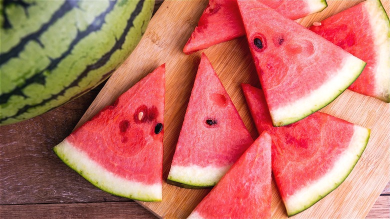 Watermelon slices on cutting board