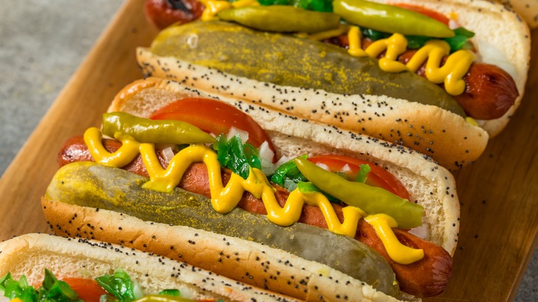 Close up of Chicago-style hot dogs.