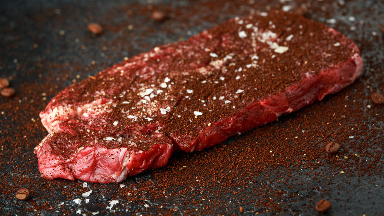 Coffee rub on steaks with coffee beans