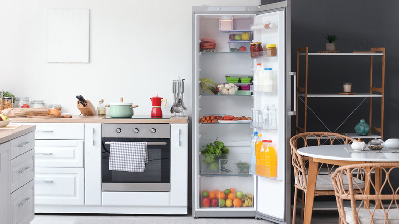 open refrigerator in home kitchen