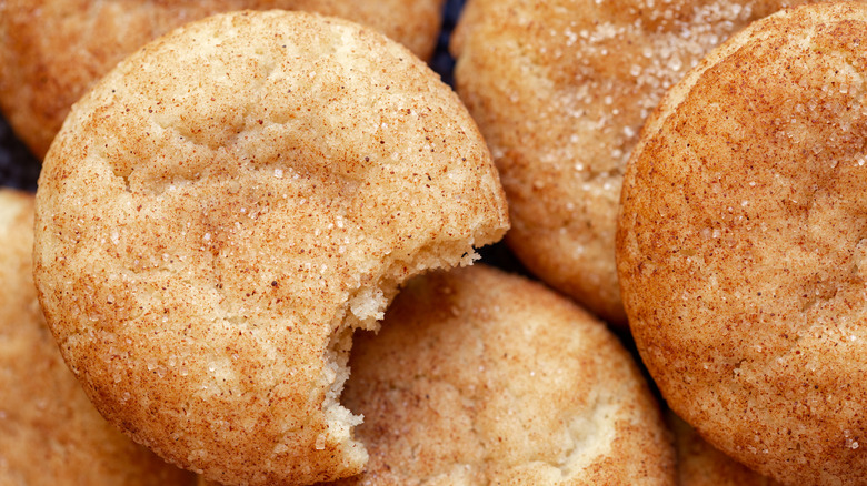 Pile of soft snickerdoodles with a bite taken