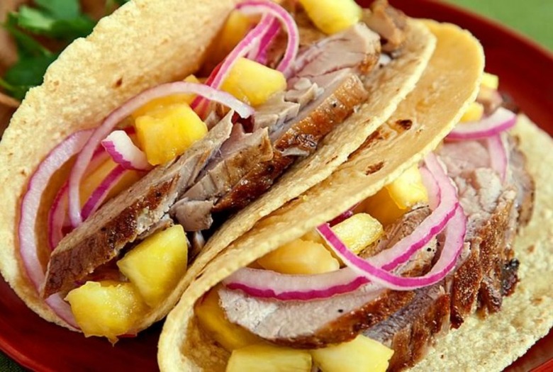 Jalapeño Pork Tacos With Pineapple Salsa and Pickled Onion