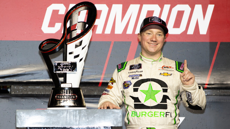 Tyler Reddick and BurgerFi trophy