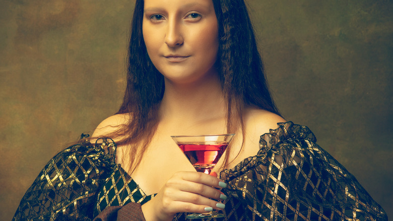 Woman holding cocktail