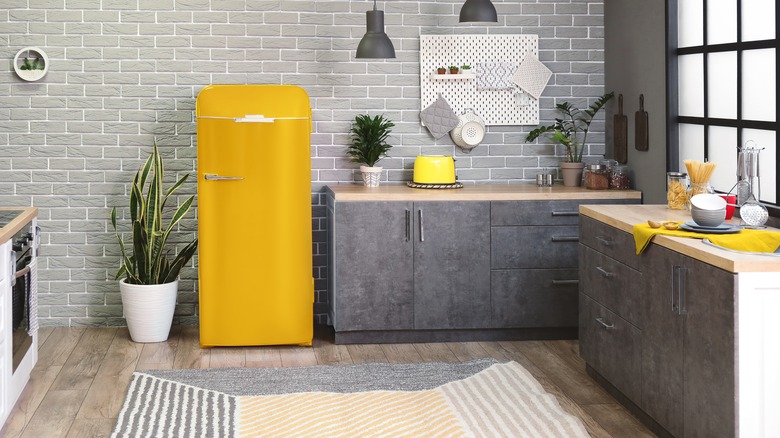 Yellow fridge in gray kitchen