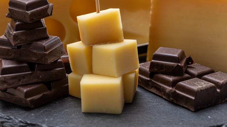 cheese cubes next to chocolate bars