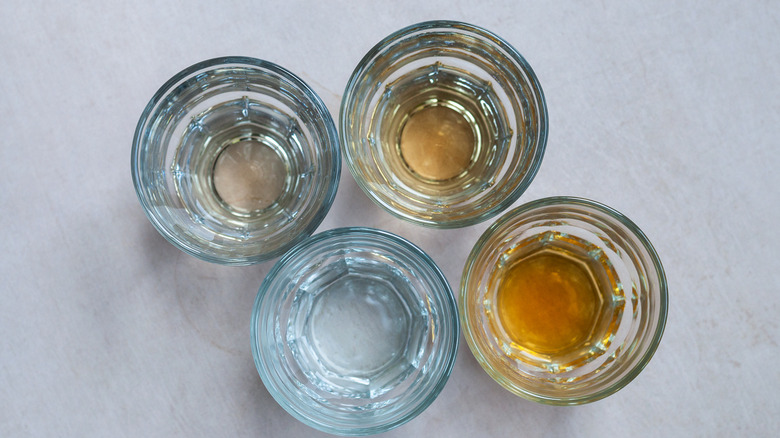 aerial shot of four filled glasses