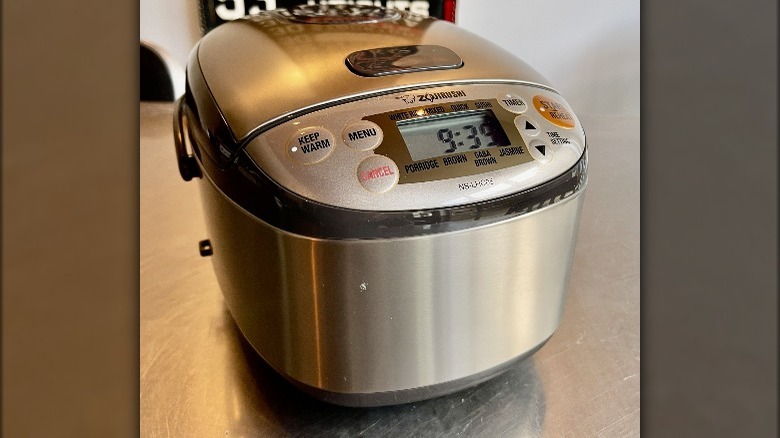 Rice cooker on metal surface