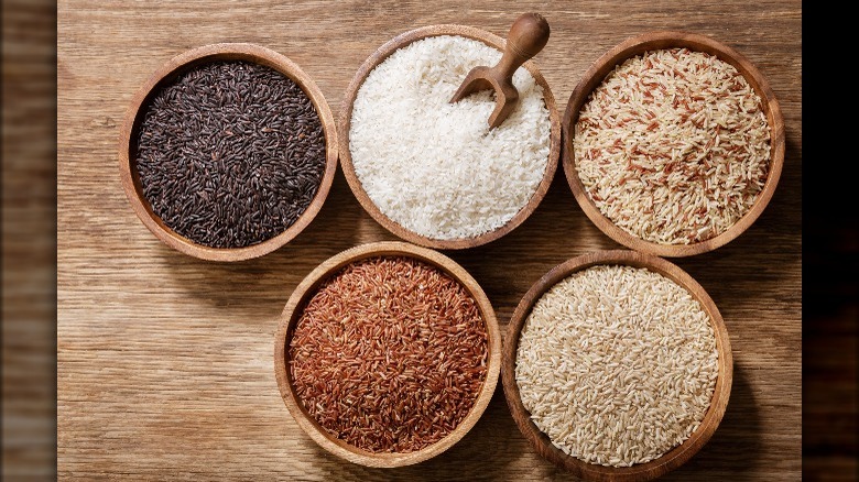Different varieties of rice in bowls