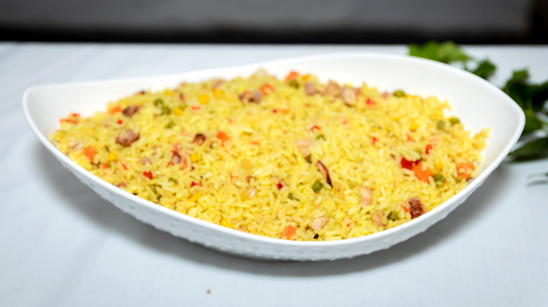 yellow rice in white plate