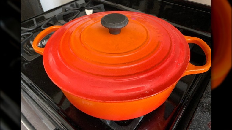 Large orange pot on stove
