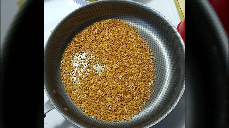 Toasting rice in a pan
