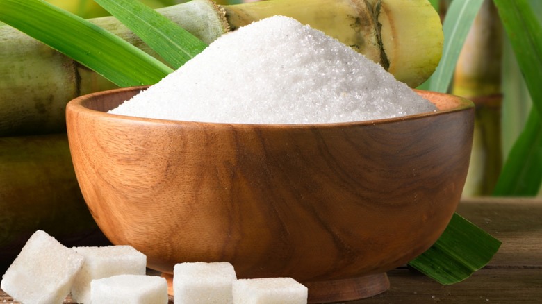 Sugar in a wooden bowl