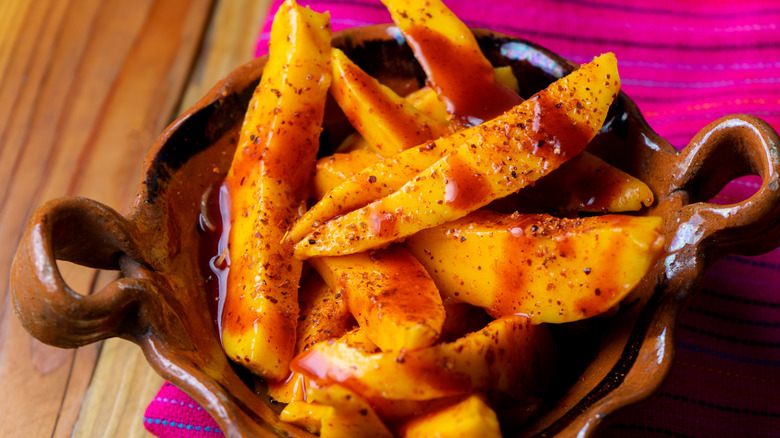 Pile of mango with Tajín drizzled over