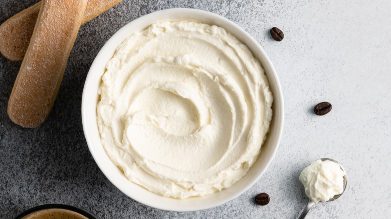 bowl of cream cheese with cookies and coffee