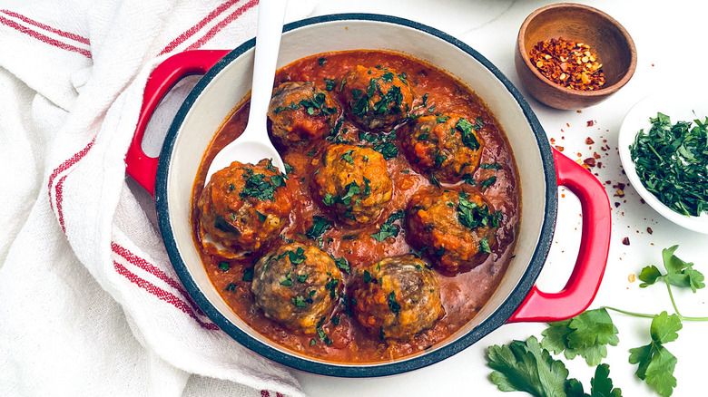 meatballs and marinara in pot