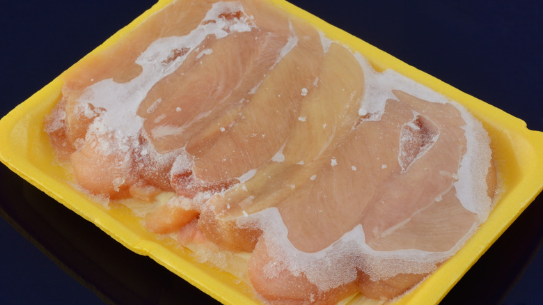 frozen chicken in tray