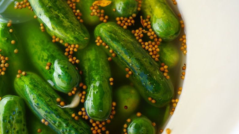 barrel of half sour pickles