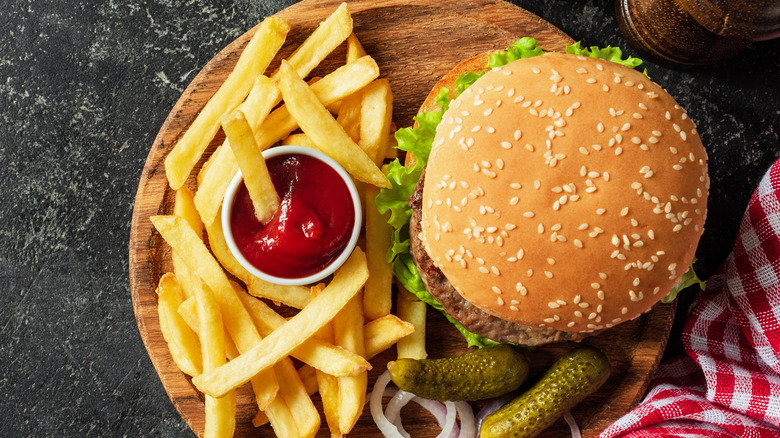 Top down burger with ketchup and fries