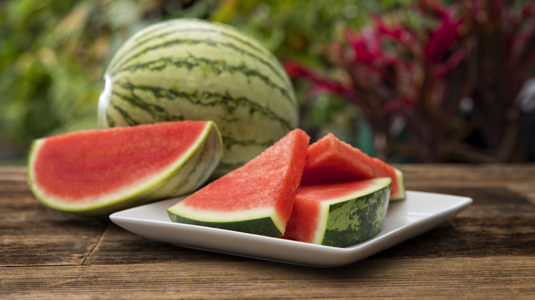 sliced and whole watermelon 