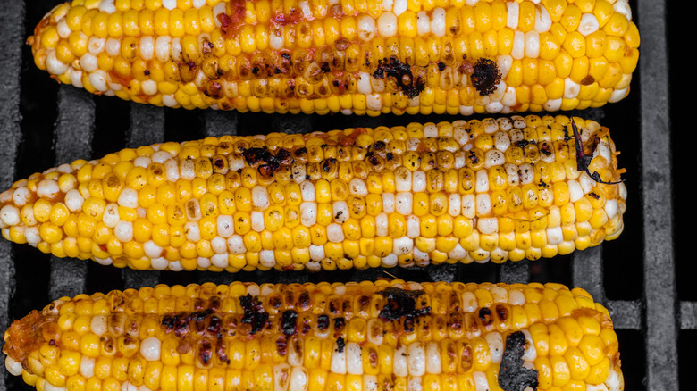 mexican street corn being grilled