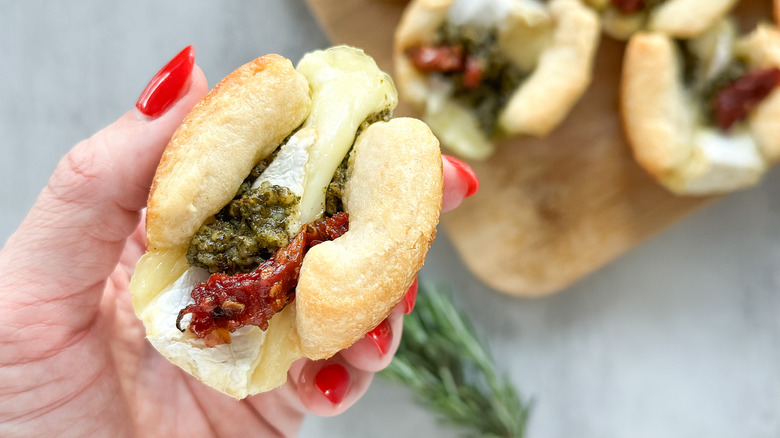 close up of single pesto brie bite