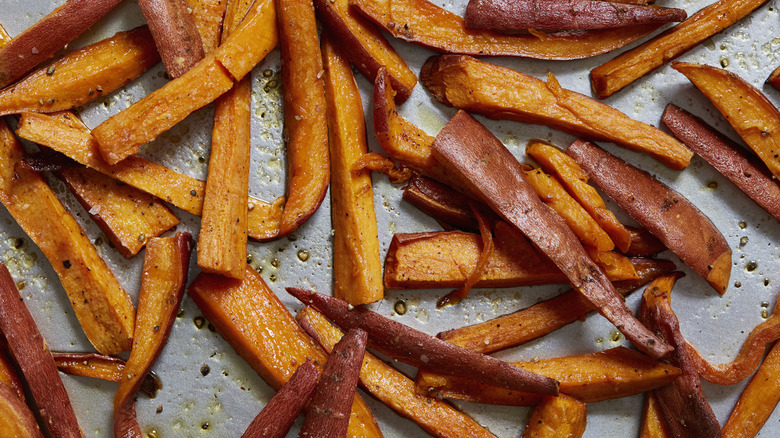 sweet potato fries on a baking sheet