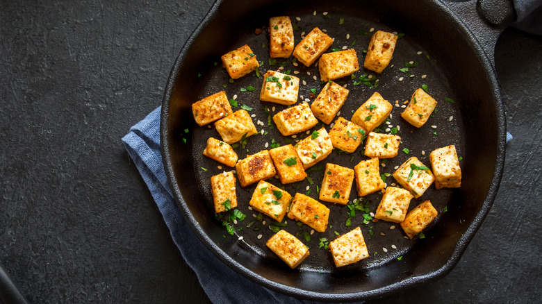 tofu cubes fried in pan