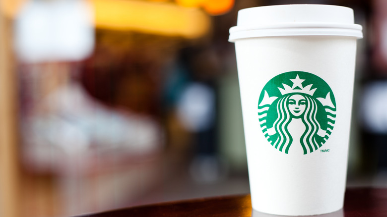 starbucks cup on table