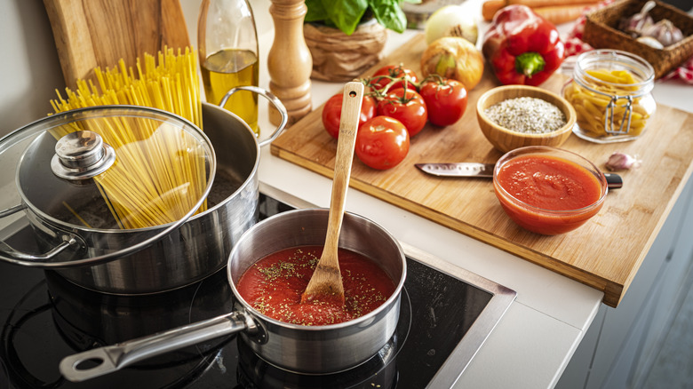 Spaghetti & sauce on a stove